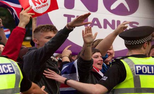 British unionist and nationalist supporters holding anti-independence signs giving Nazi salutes in Glasgow, Scotland
